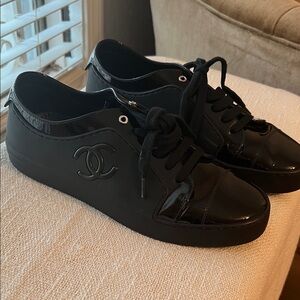 CHANEL Black Patent Leather Low-Top Sneakers